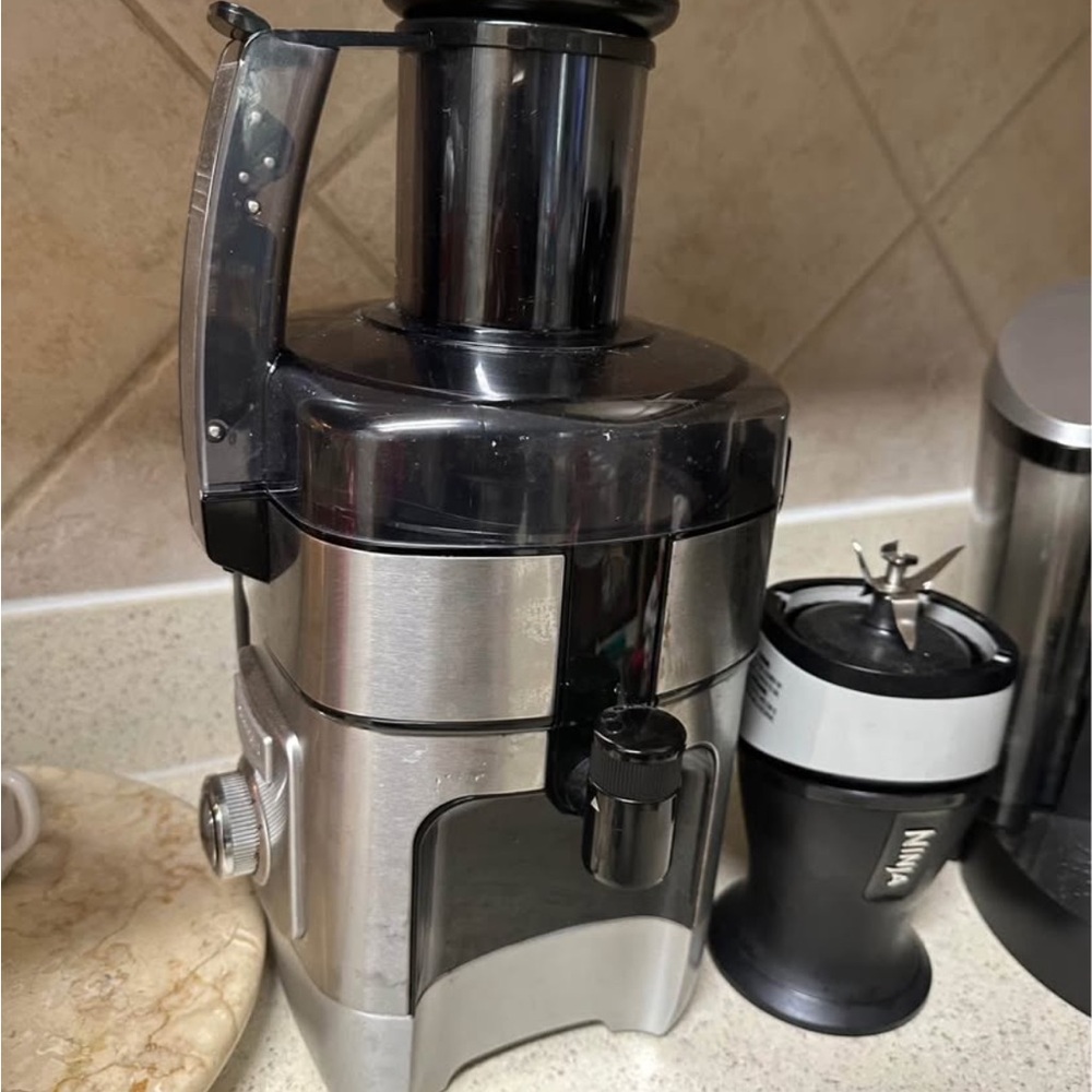 Stainless Steel Juicer with Black Accents